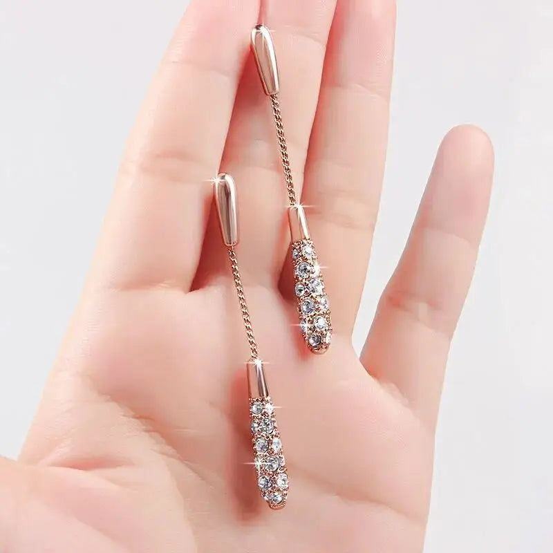 “Korean Tassel Pearl Drop Earrings - Luxury Gold Wedding Jewelry.”