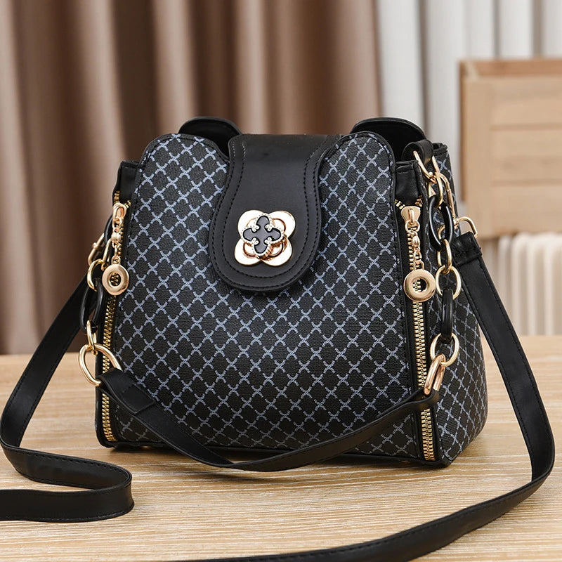 “Luxury bucket handbag for women, check print, spacious design, crossbody style.”