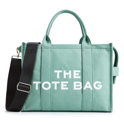 “Designer canvas tote bag, large capacity, adjustable shoulder strap, crossbody style.”