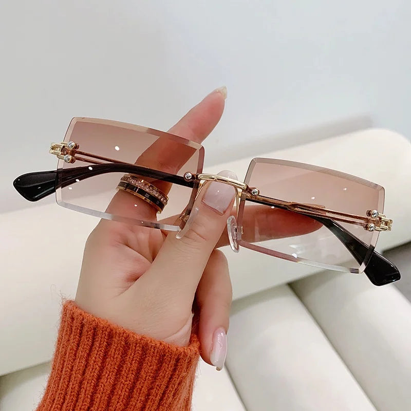 “Luxury rectangle rimless sunglasses, gradient colors, stylish unisex design.”