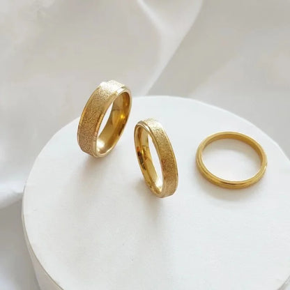 “SUNIBI Frosted Stainless Steel Ring - Simple Gold Color Wedding Jewelry for Women.”