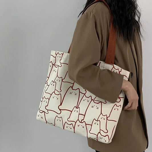 “Canvas tote bag for women, cute cat design, zipper, small Japanese style.”