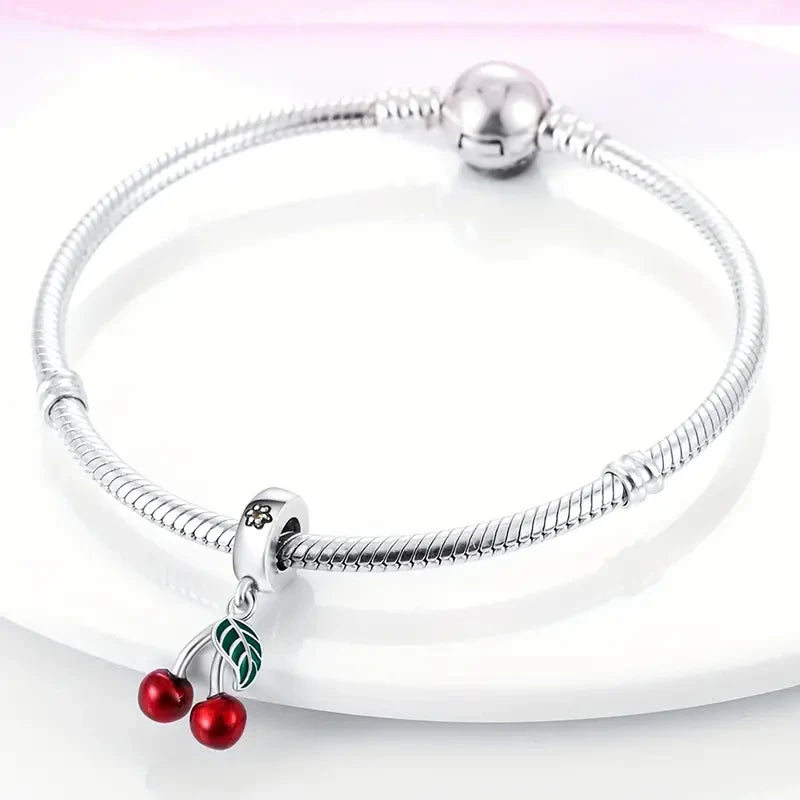 “Red enamel cherry charm beads for bracelet, necklace, keychain, DIY jewelry gift.”