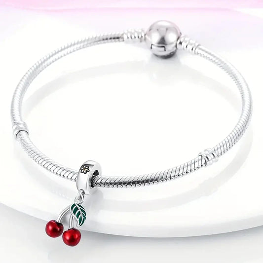 “Red enamel cherry charm beads for bracelet, necklace, keychain, DIY jewelry gift.”