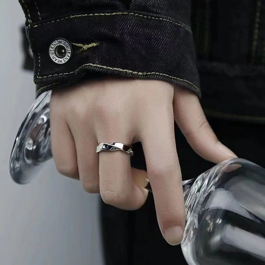 “Mobius Wave Ring - Silver Color Alloy Open Ring for Women & Men, Retro Style.”