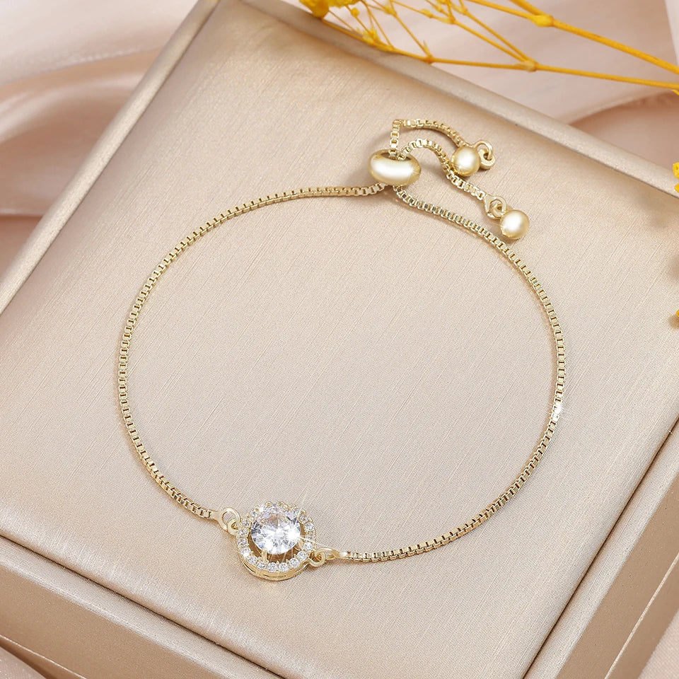 “Trendy Interlocked Gold-Color Circle Bangle for Women, Exquisite Party Jewelry.”