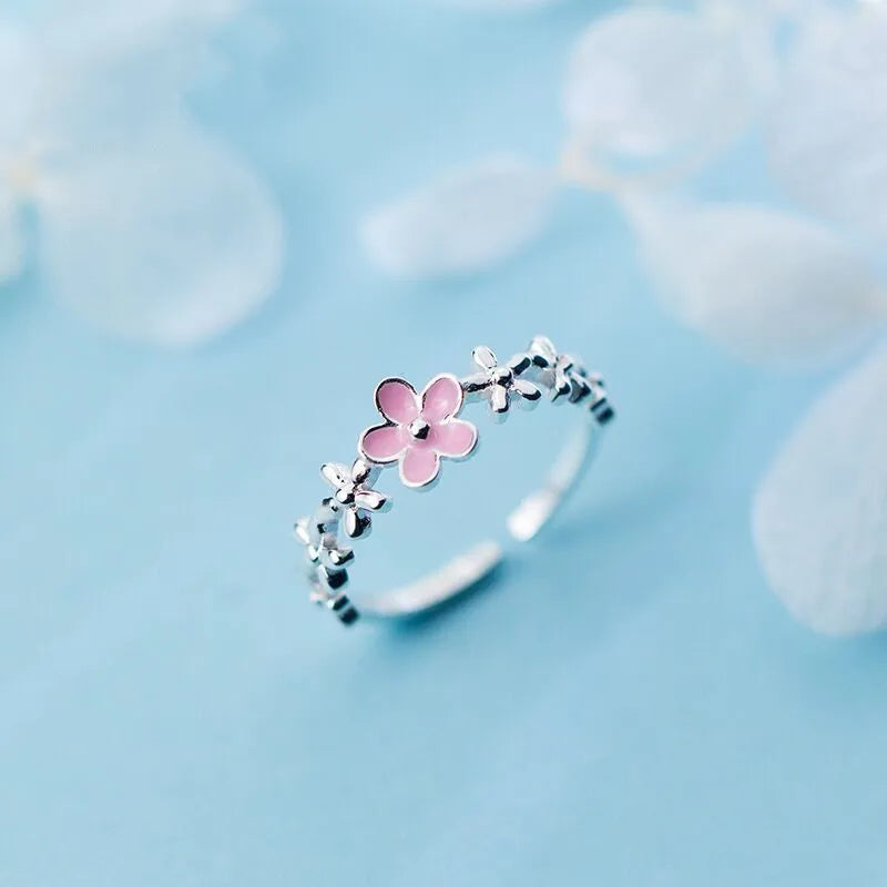 “Luxury Zircon Flower Rings for Women - Rose, Cherry Blossom, Tulip Design, Adjustable.”