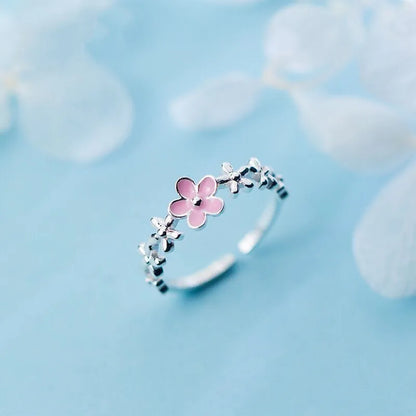 “Luxury Zircon Flower Rings for Women - Rose, Cherry Blossom, Tulip Design, Adjustable.”