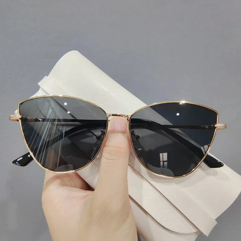 “Retro cat-eye sunglasses, small metal frame, European style, UV400 protection.”