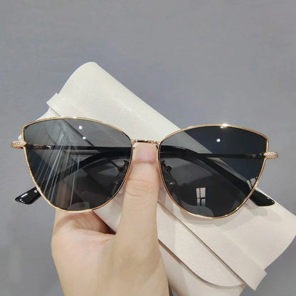 “Retro cat-eye sunglasses, small metal frame, European style, UV400 protection.”