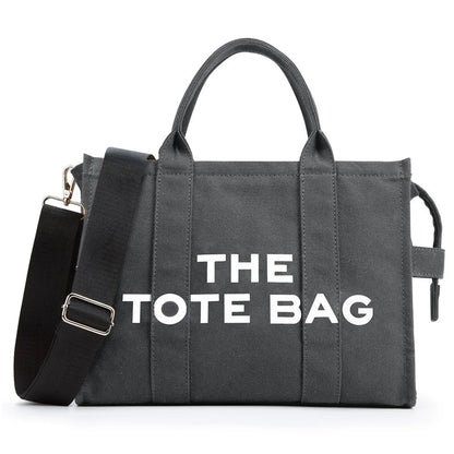 “Designer canvas tote bag, large capacity, adjustable shoulder strap, crossbody style.”