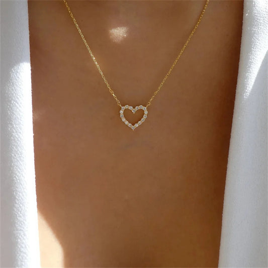 “Crystal hollow love pendant necklace, romantic zircon, simple trendy jewelry for women.”