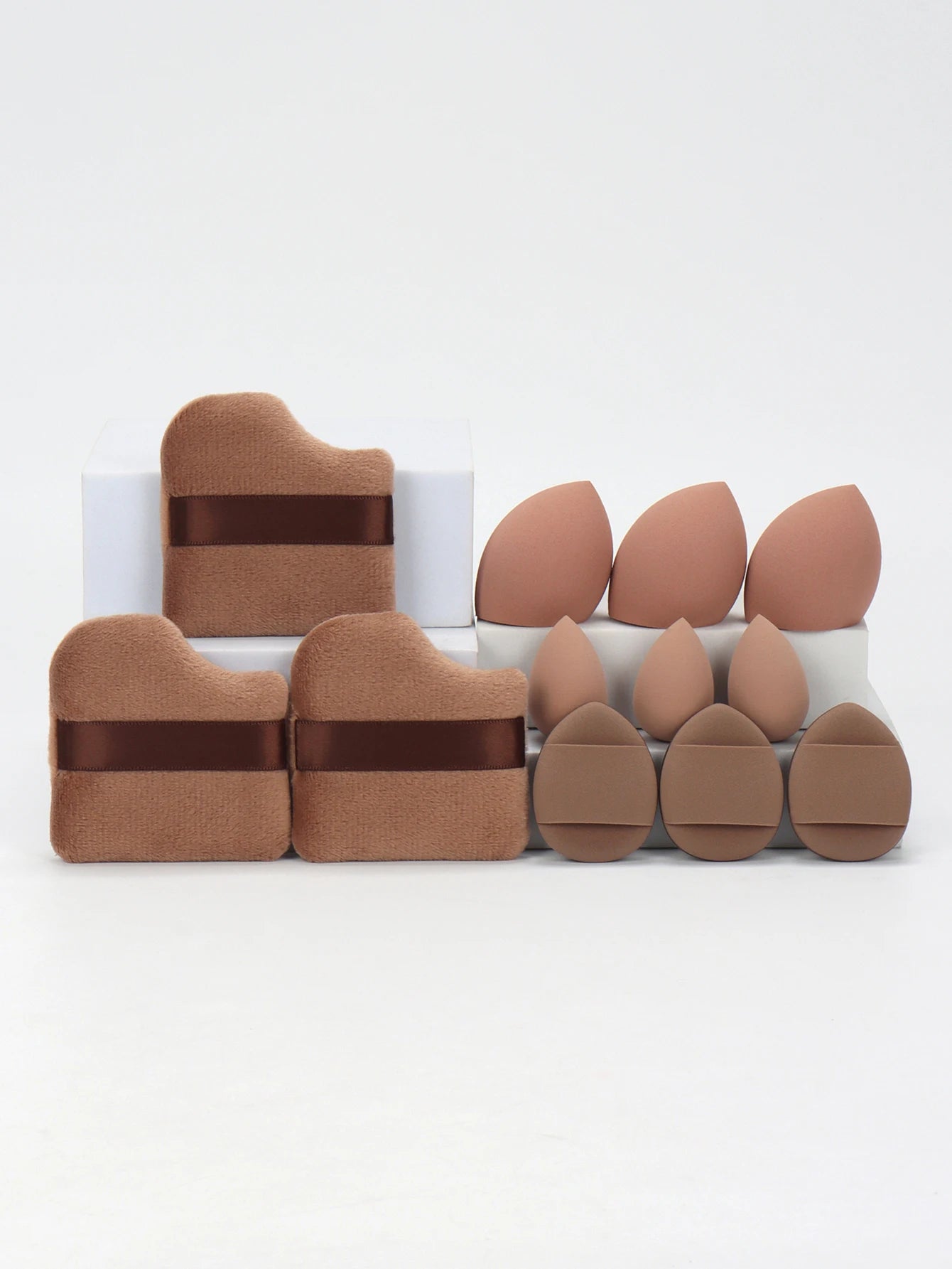 “12-piece makeup sponge set: powder puffs, air cushion puffs, and beauty eggs.”