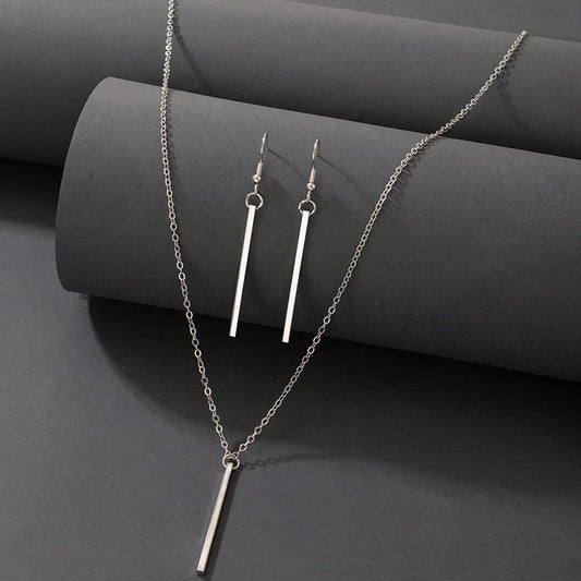 “Elegant Gold Stick Jewelry Set - Necklace & Earrings for Women.”