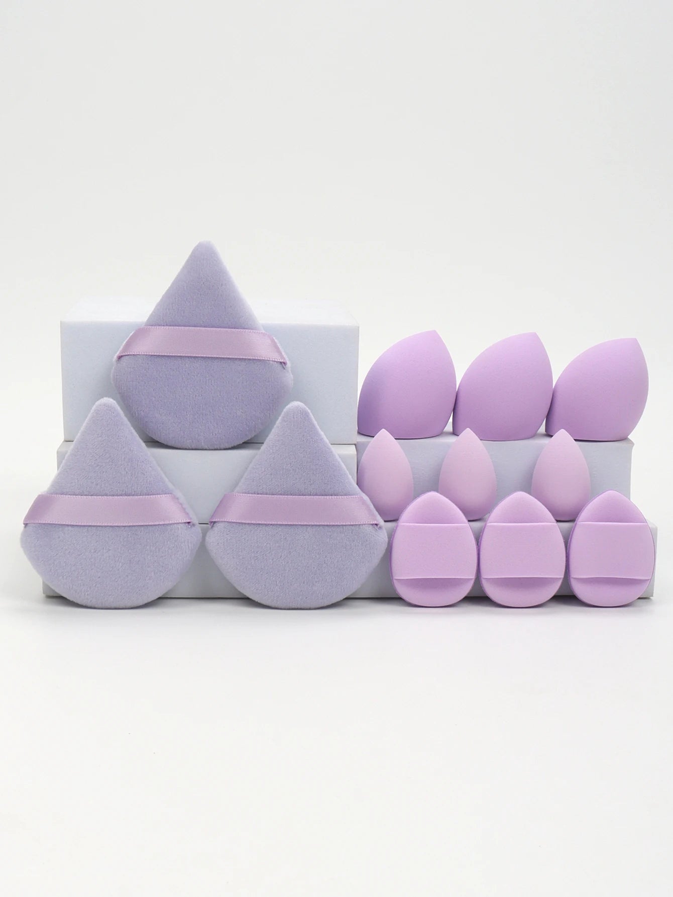 “12-piece makeup sponge set: powder puffs, air cushion puffs, and beauty eggs.”