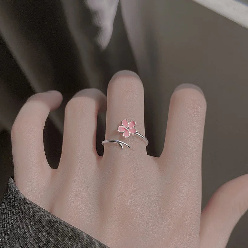 “Luxury Zircon Flower Rings for Women - Rose, Cherry Blossom, Tulip Design, Adjustable.”