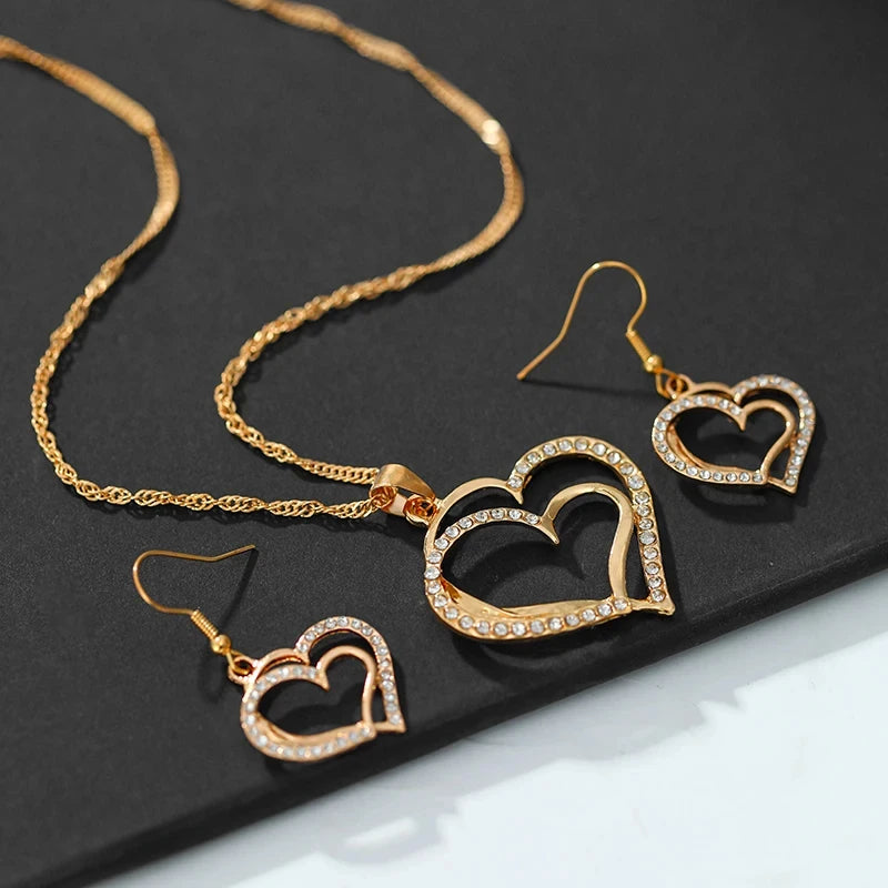 “3-Piece Heart-Shaped Jewelry Set - Earrings, Pendant, Necklace with Rhinestones.”
