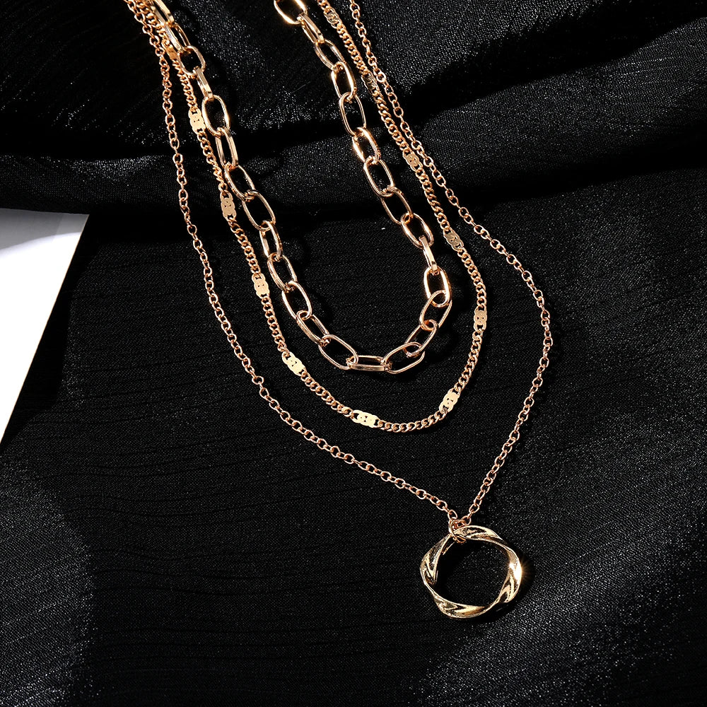 “IPARAM Gold Multi-Layered Chain Necklace – Vintage Circle Pendant, Fashion Jewelry for Women & Girls”
