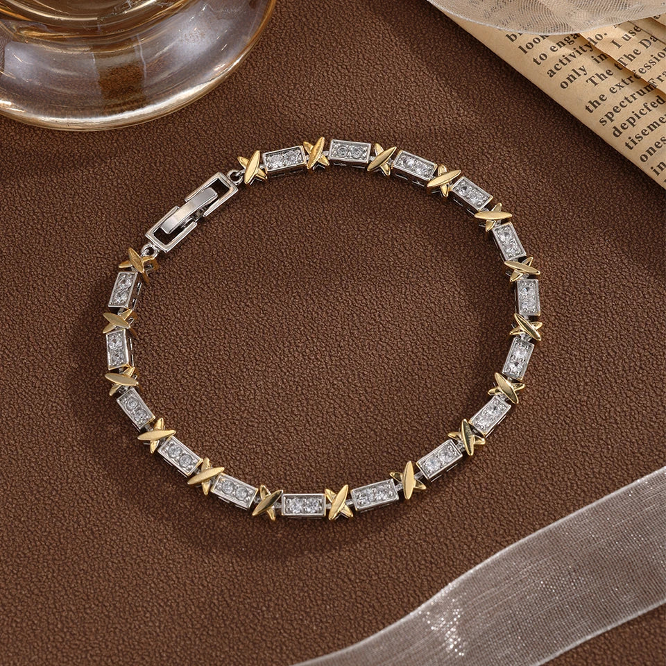 “Elegant X Cross Zirconia Charm Bracelet for Women and Men, Luxury Wedding Party Jewelry.”
