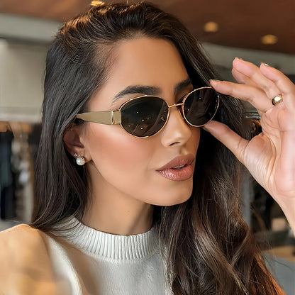 “Oval sunglasses with metal frame, trendy unisex design, classic shades.”