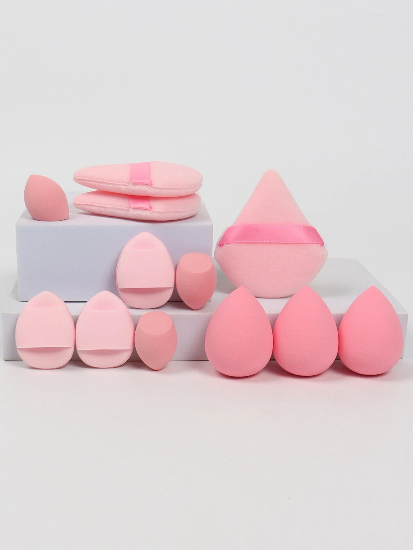 “12-piece makeup sponge set: powder puffs, air cushion puffs, and beauty eggs.”