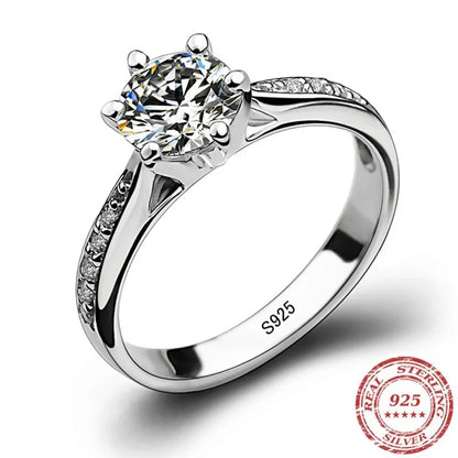 “Luxury 925 sterling silver classic ring for women with a 70ct imitation diamond in a six-claw setting.”
