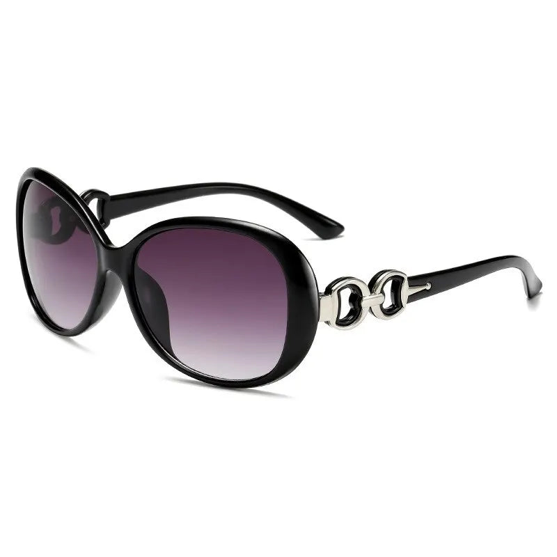 “Fashionable large-frame sunglasses, gradient lenses, trendy women’s street style.”