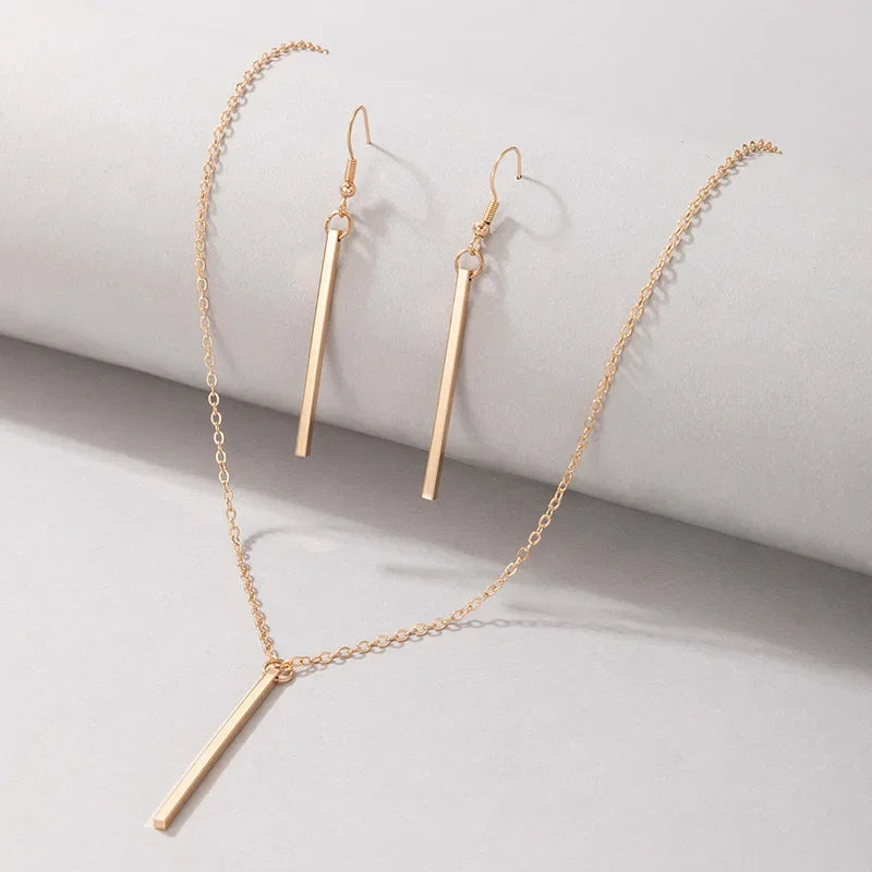 “Elegant Gold Stick Jewelry Set - Necklace & Earrings for Women.”