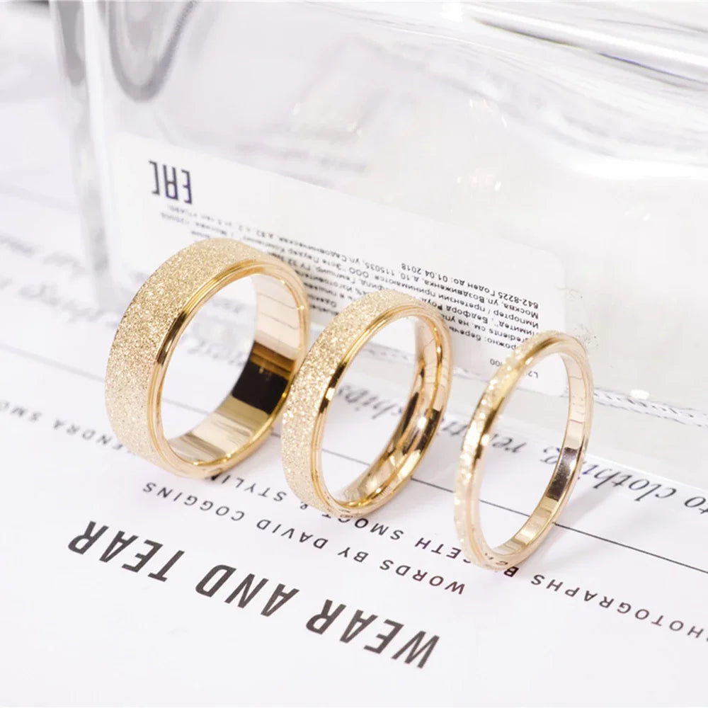 “SUNIBI Frosted Stainless Steel Ring - Simple Gold Color Wedding Jewelry for Women.”