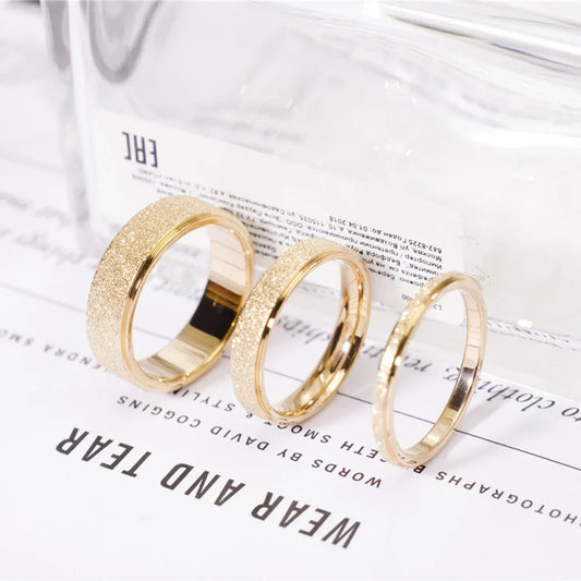 “SUNIBI Frosted Stainless Steel Ring - Simple Gold Color Wedding Jewelry for Women.”