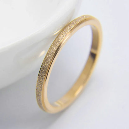 “SUNIBI Frosted Stainless Steel Ring - Simple Gold Color Wedding Jewelry for Women.”